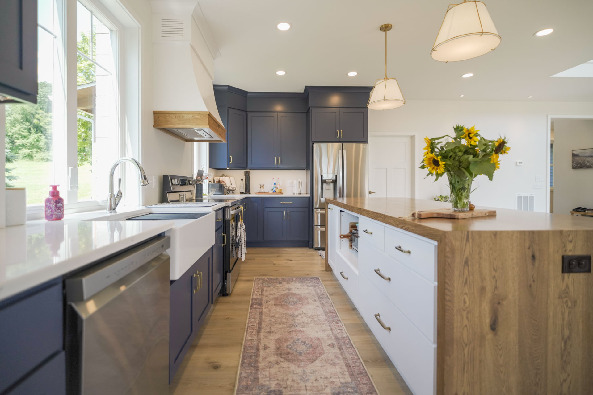 Byler Residence — full kitchen view with farmhouse sink, custom hood, and white oak island — KB Builders, Central Pennsylvania