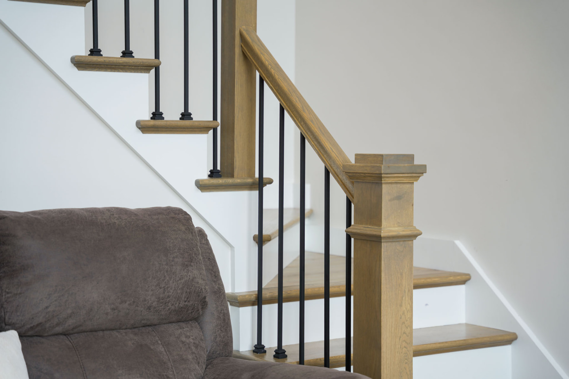 Byler Residence — craftsman oak newel post and handrail detail on the staircase — KB Builders, Central Pennsylvania