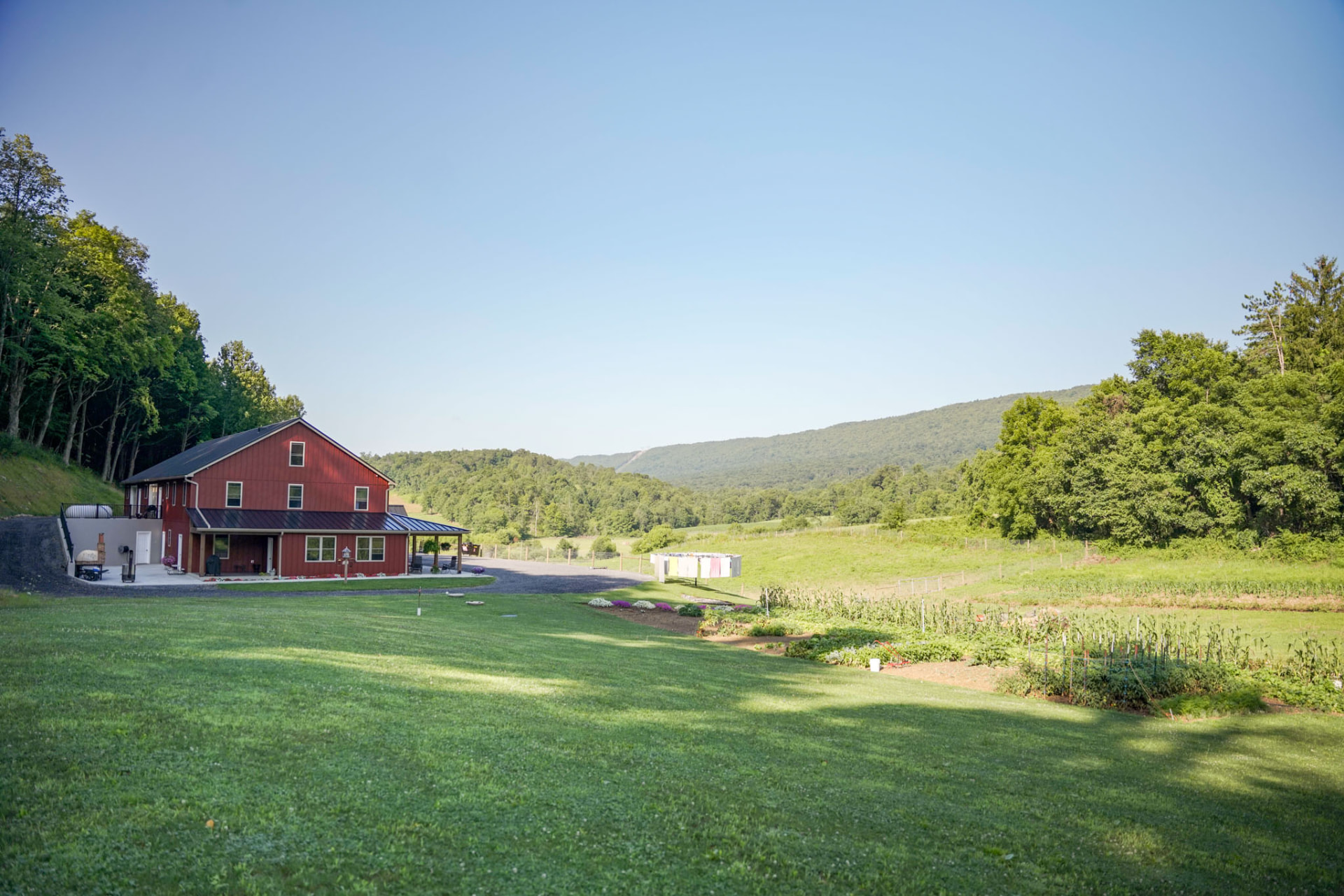 Peachy Residence — barndominium overlooking open pasture and mountain ridge in central Pennsylvania — KB Builders, McVeytown, PA
